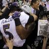 Baltimore Ravens quarterback Joe Flacco celebrates with linebacker Ray Lewis after defeating the San Francisco 49ers 34-31 in Super Bowl XLVII at Mercedes-Benz Superdome in New Orleans on Sunday, Feb. 3, 2013.